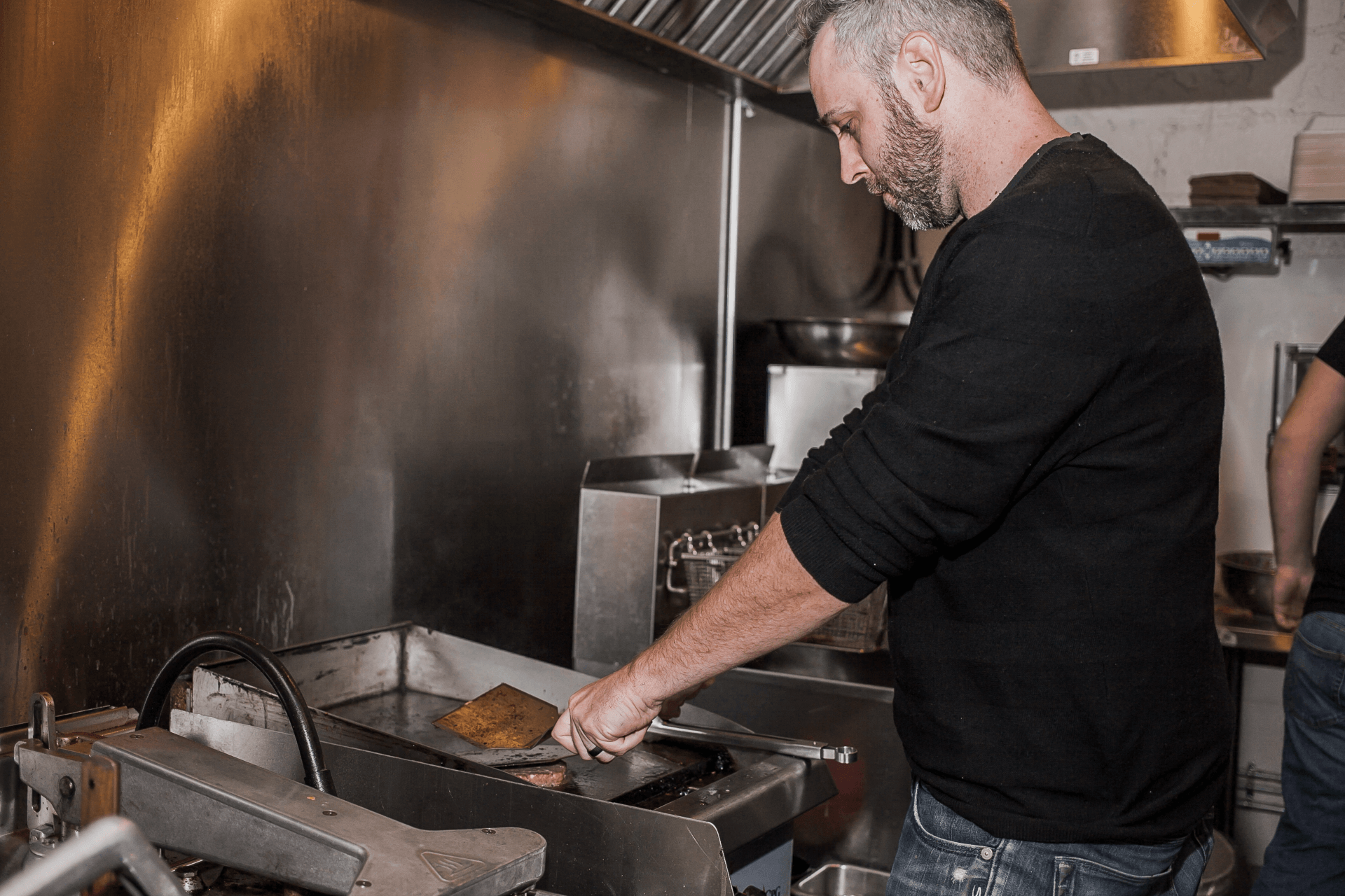 owner preparing food