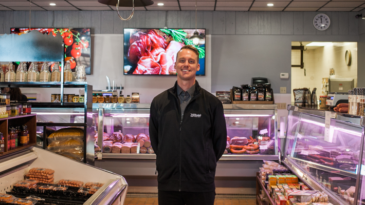 owner standing in store