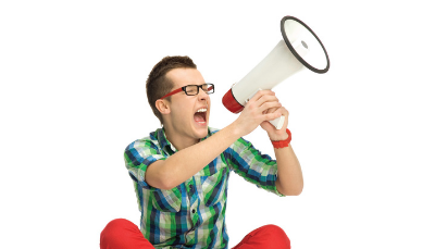 man yelling into a microphone