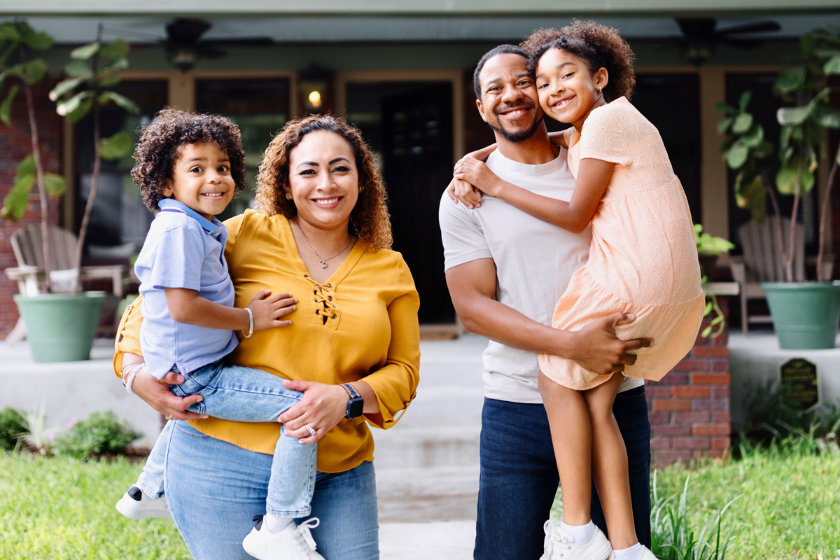 Family in front of a home