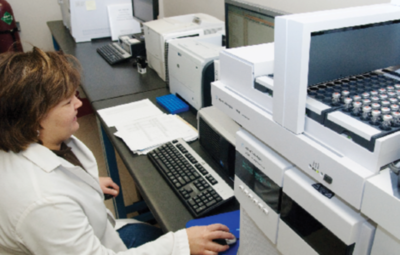 female scientist sitting at computer