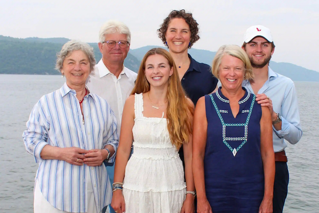 Family portrait of the Beach Family by the water