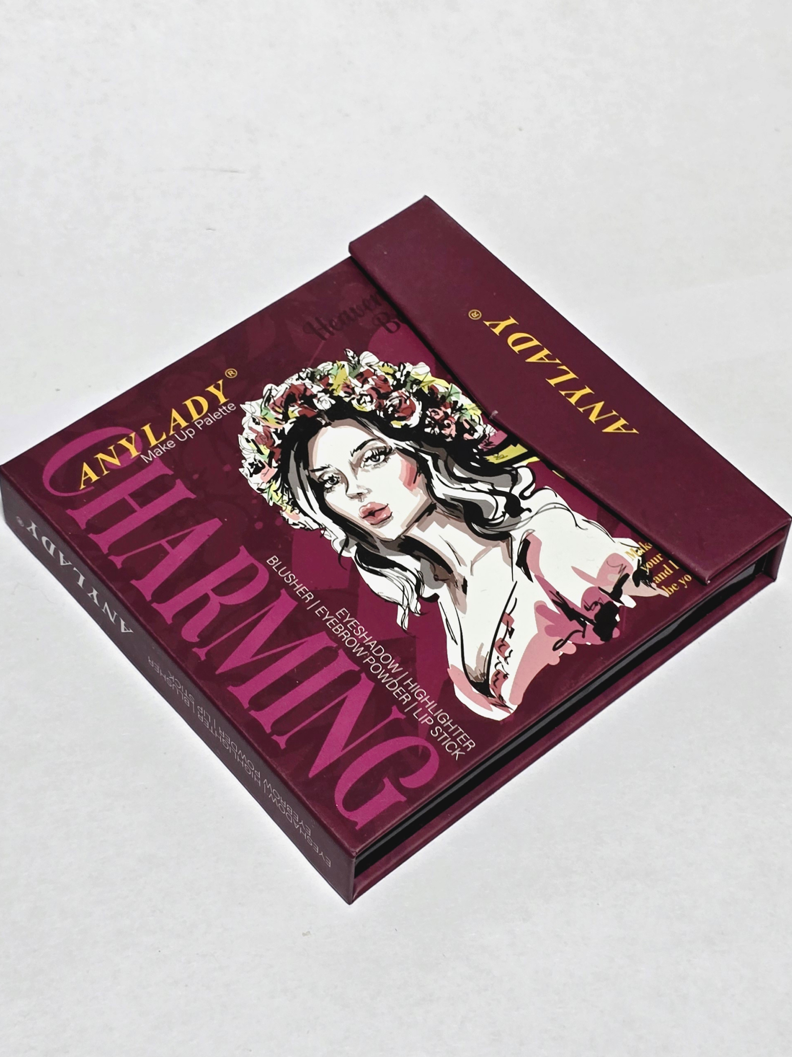 Book-shaped eyeshadow with a brush, blush, contouring, lipstick