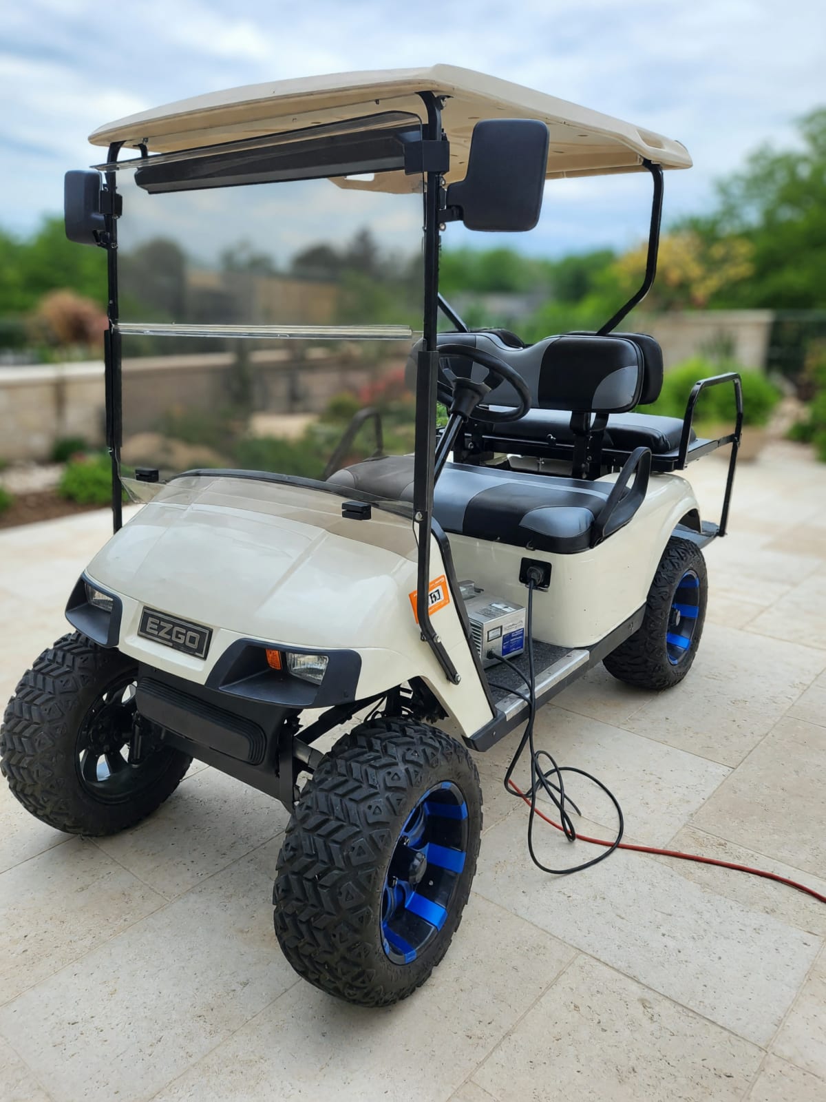 EZGO 36 Volt Lifted 4-Seater Golf Cart in Like New Condition