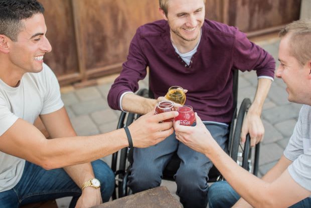 men drinking beers together