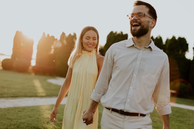 a happy couple who have solved their bedroom struggles with the help of ED medication