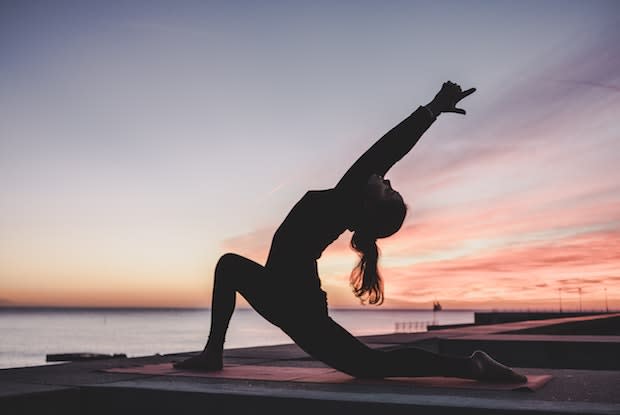 a woman doing yoga