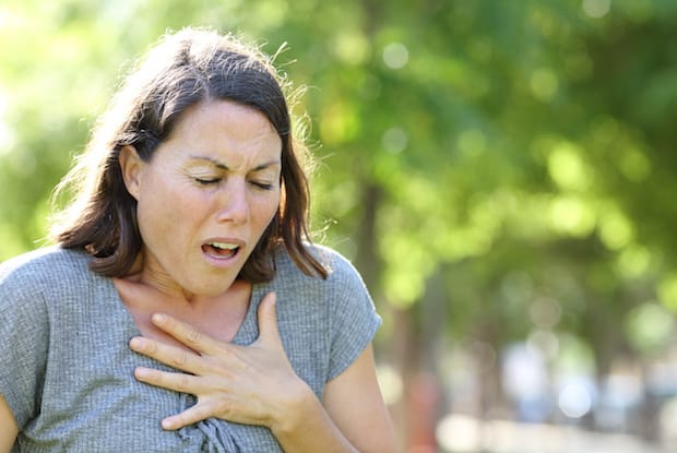 a woman having shortness of breath