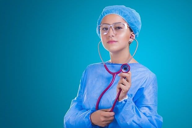 a doctor holding up a stethoscope