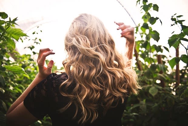 person with long blonde hair