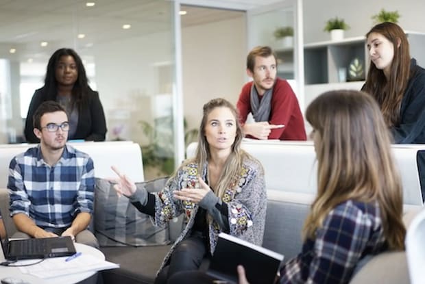 A group of people having a meeting