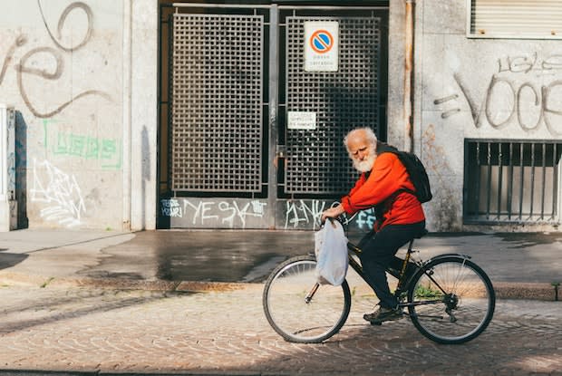 an older man on a bike