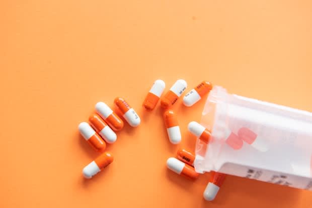 pills on an orange background