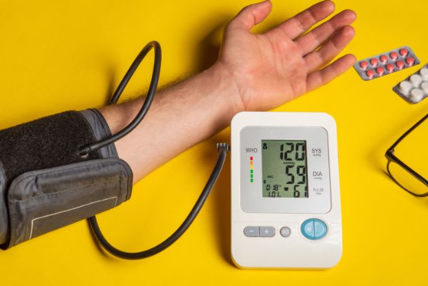 man taking his blood pressure