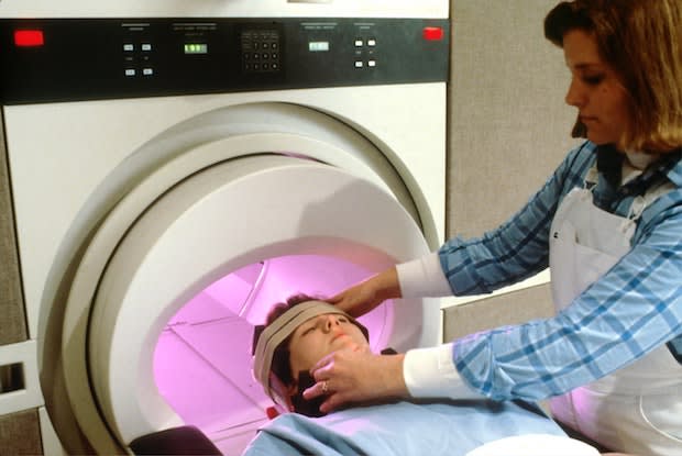 a person getting a CT scan