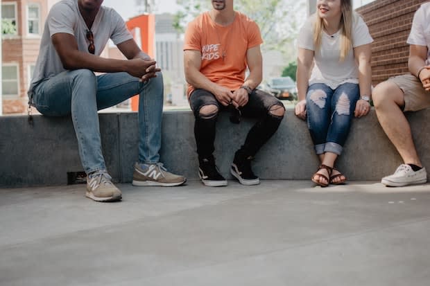 four friends talking to each other