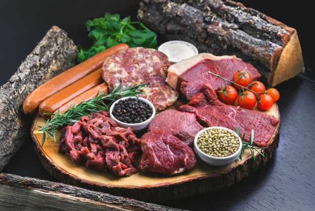 a platter of several raw meats