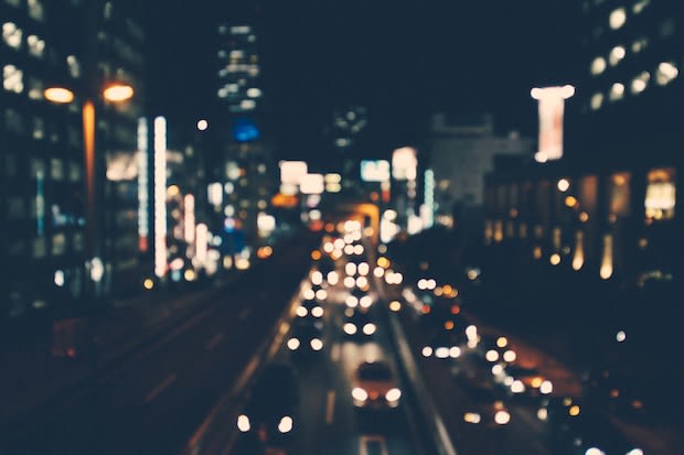 A blurred image of a busy night time road