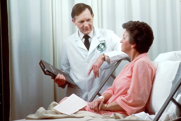 a doctor talking to his patient