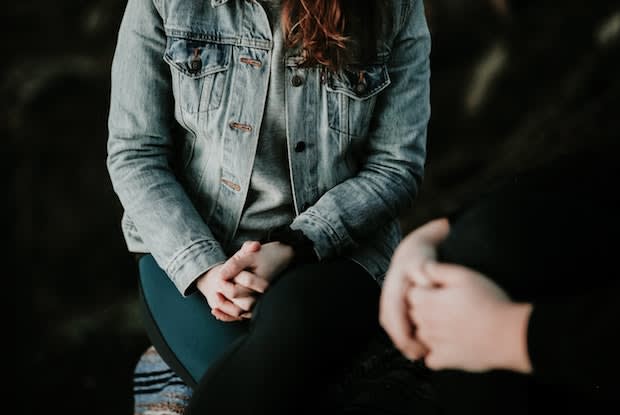 a woman sitting down