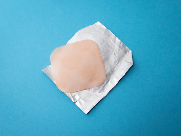 a hormone patch on a blue background