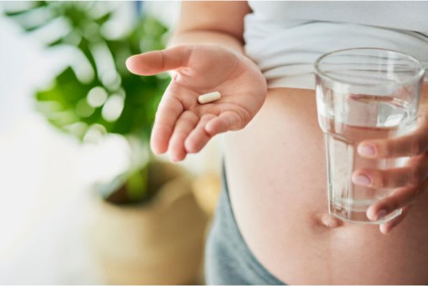 pregnant woman taking medication