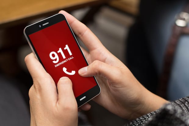 a person dialing 911