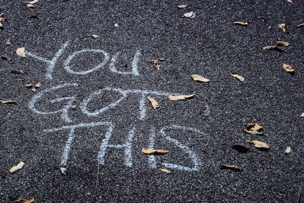 a chalk drawing on concrete that says ‘you got this’