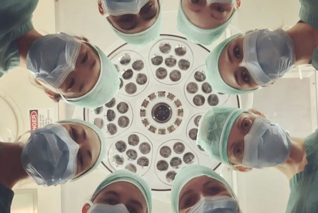 a point-of-view rendition of doctors looking down