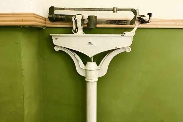 an old fashioned medical scale