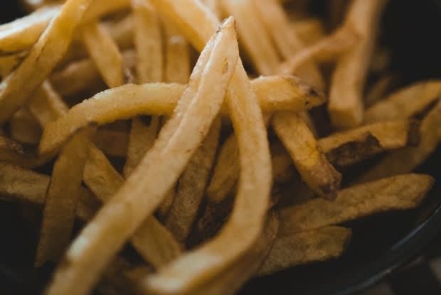 a close-up image of fries