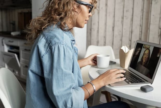 A woman having a video call with a friend