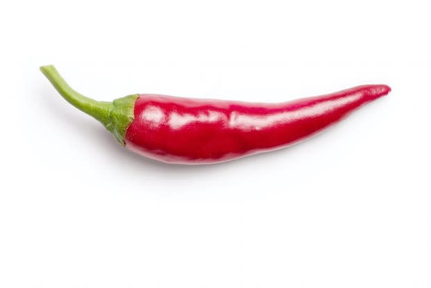 a red pepper on a white background