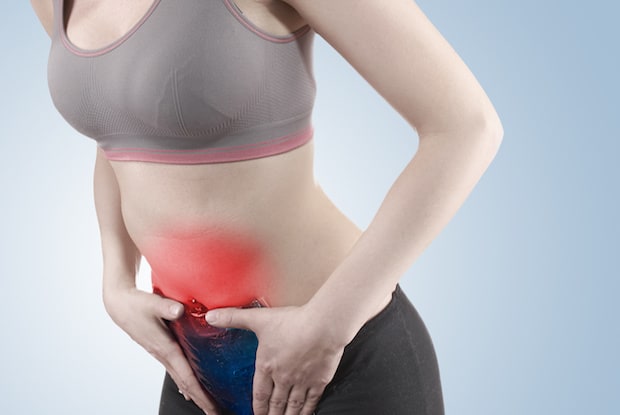 a woman with stomach pain