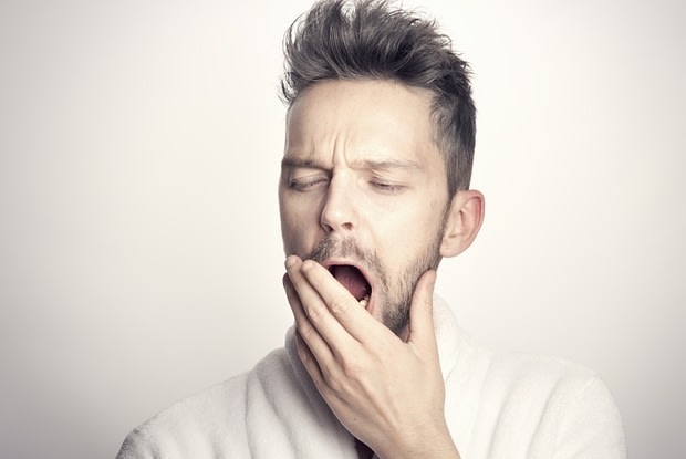 a man yawning