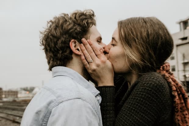 two people kissing