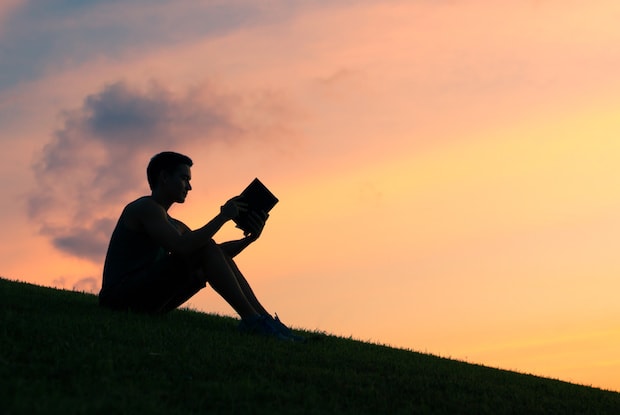 a man reading a book