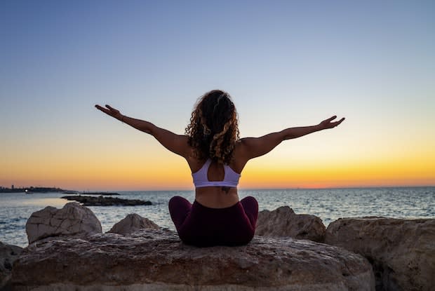 a woman doing yoga