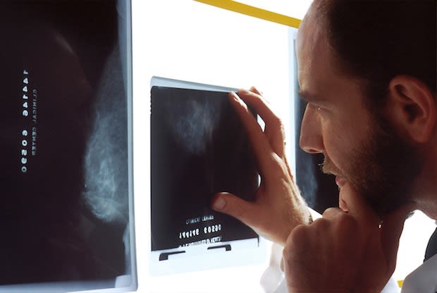 a doctor looking at an x ray