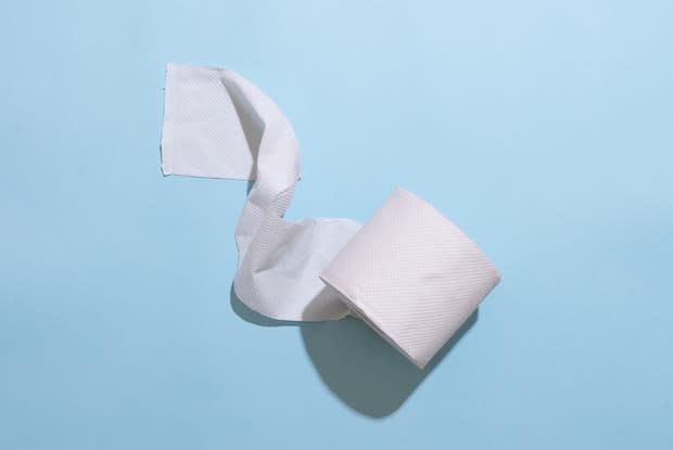 toilet paper on a blue background