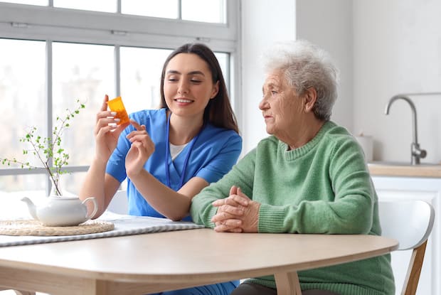 a nurse explaining some information to a patient