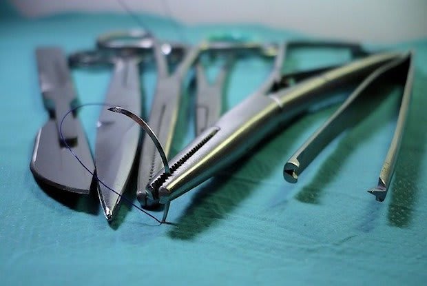 surgical tools lined up next to each other