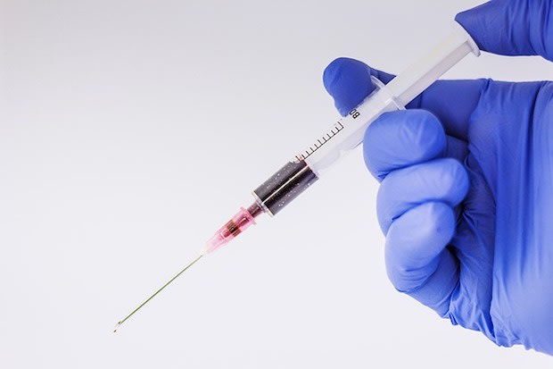 a syringe with blood in it