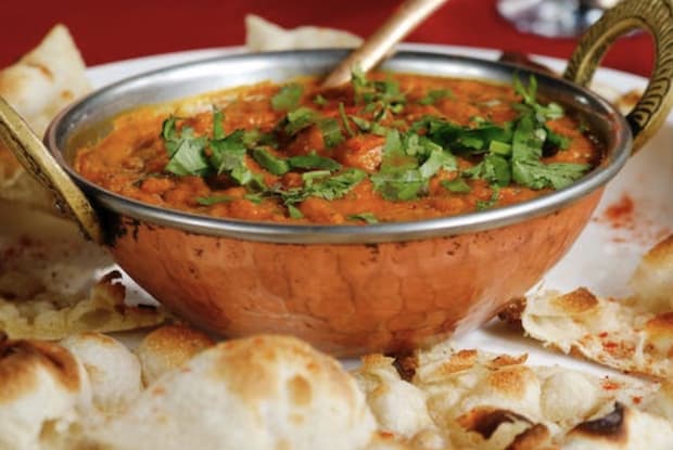 An Indian curry with naan bread