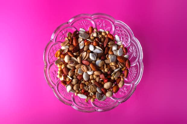 a bowl of nuts and lentils