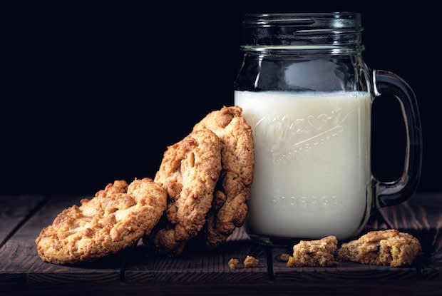 a glass of milk and cookies