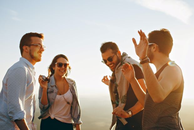 a group of friends talking to each other