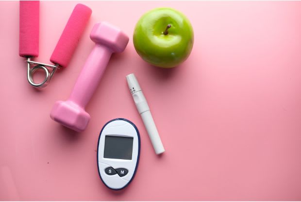 blood sugar monitor with apple and exercise equipment