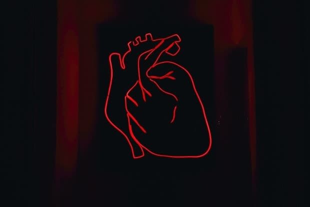 a neon sign of the heart muscle