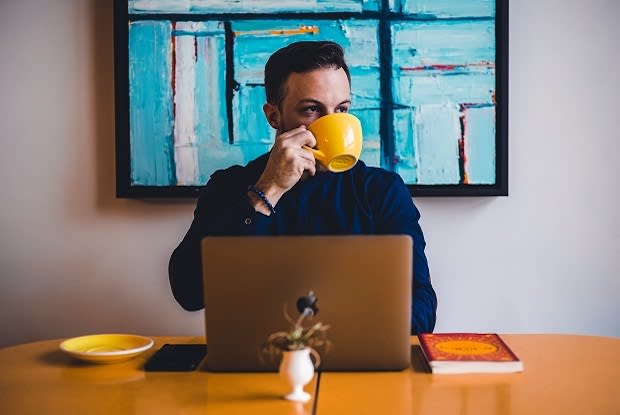 a person drinking coffee